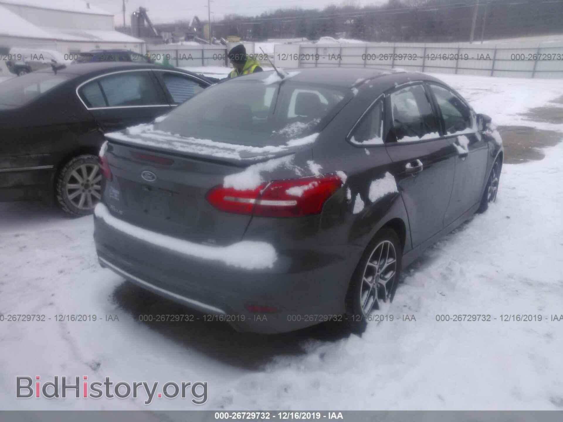 2016 FORD FOCUS - VIN: 1FADP3F22GL243136 - Photo 4