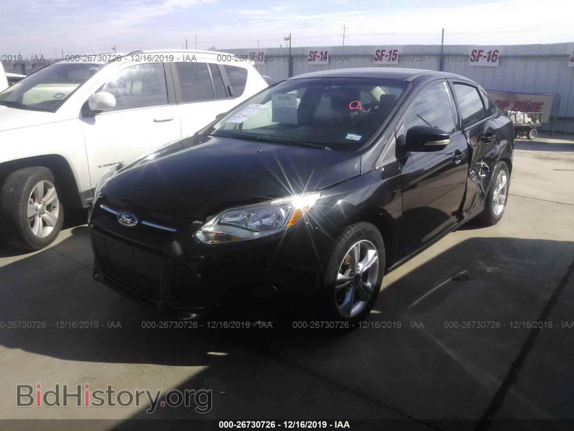 2014 Ford Focus - VIN: 1FADP3F28EL161358 - Photo 2