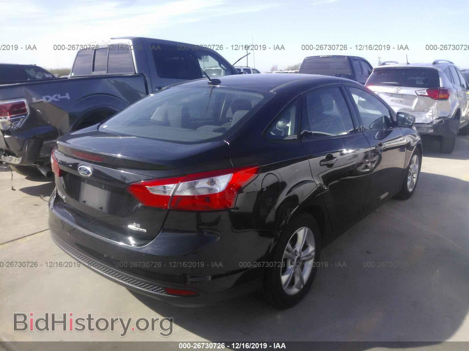 2014 Ford Focus - VIN: 1FADP3F28EL161358 - Photo 4
