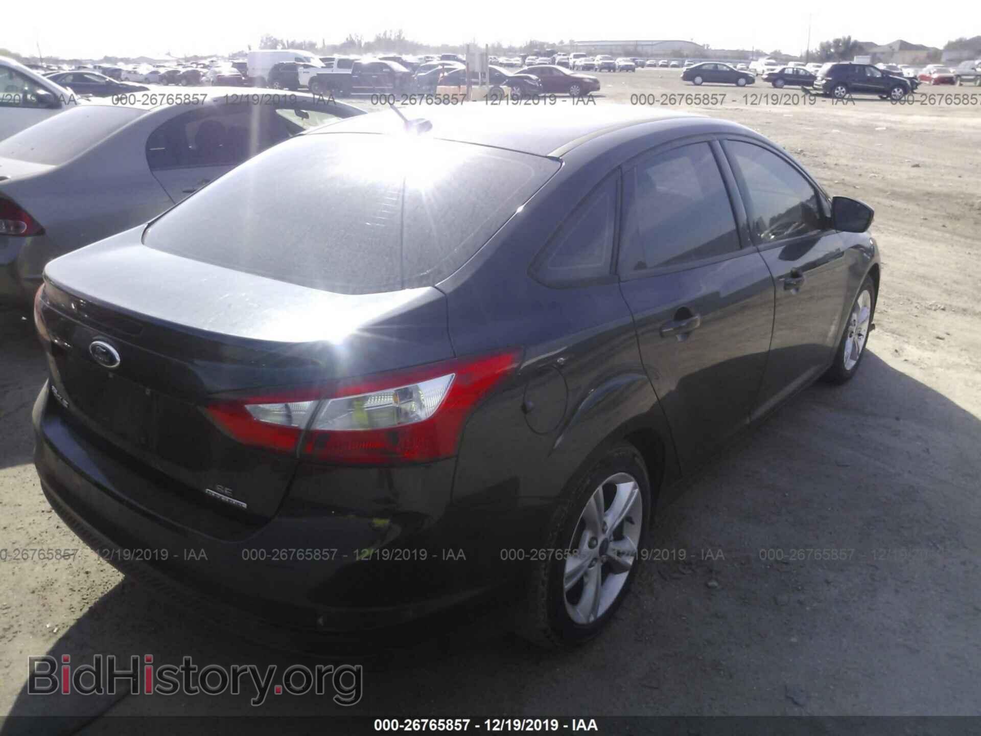 2014 Ford Focus - VIN: 1FADP3F26EL117696 - Photo 4