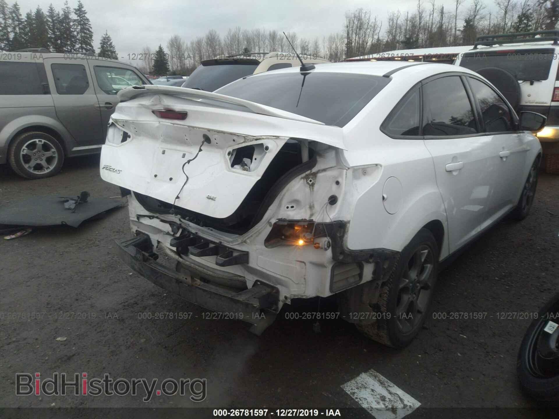 2014 Ford Focus - VIN: 1FADP3F20EL341921 - Photo 4