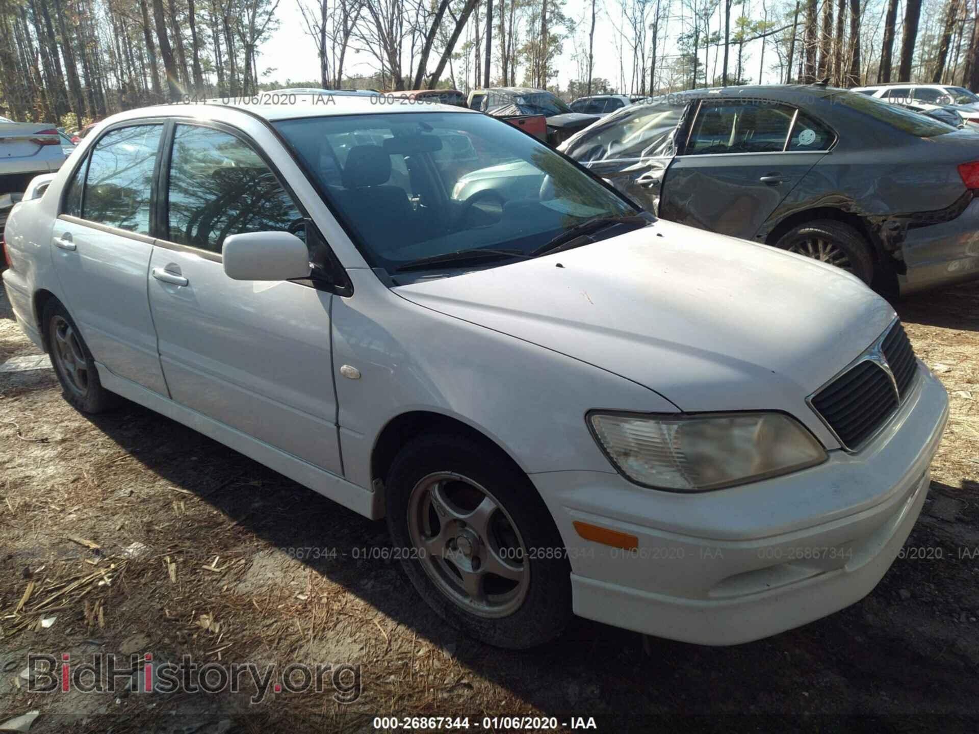 Фотография JA3AJ86E02U031813 - MITSUBISHI LANCER 2002