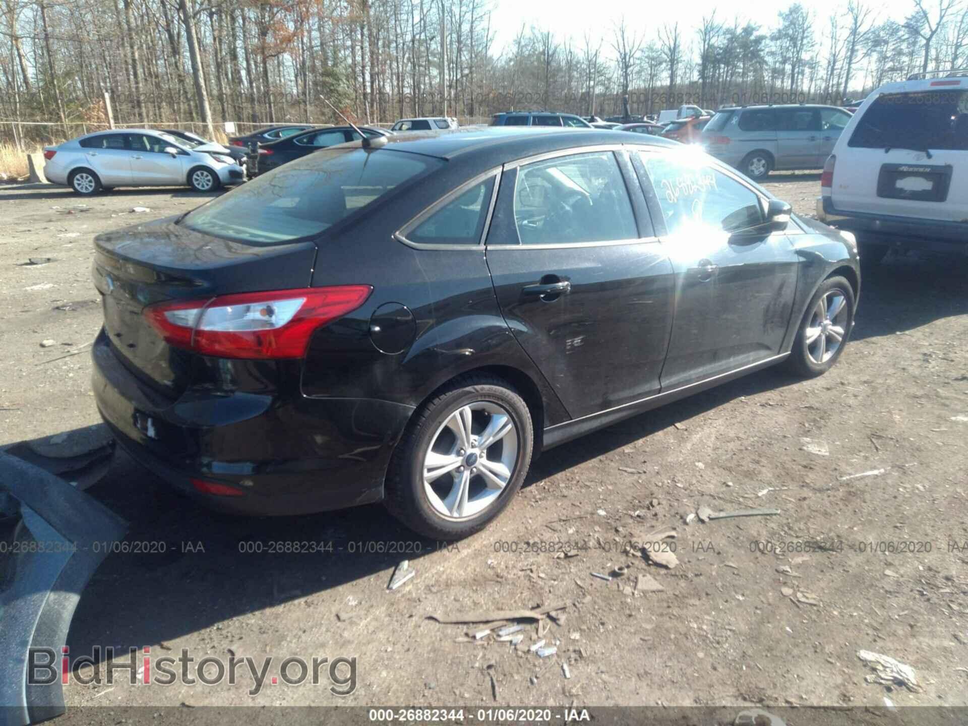 2014 FORD FOCUS - VIN: 1FADP3F22EL382292 - Photo 4