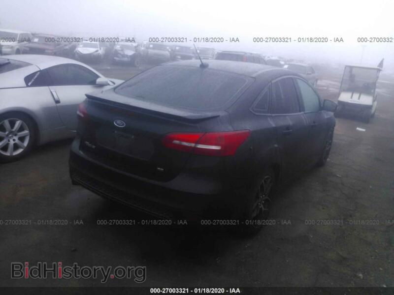 2016 Ford FOCUS (VIN 1FADP3F22GL209469) — фото 4 из 11