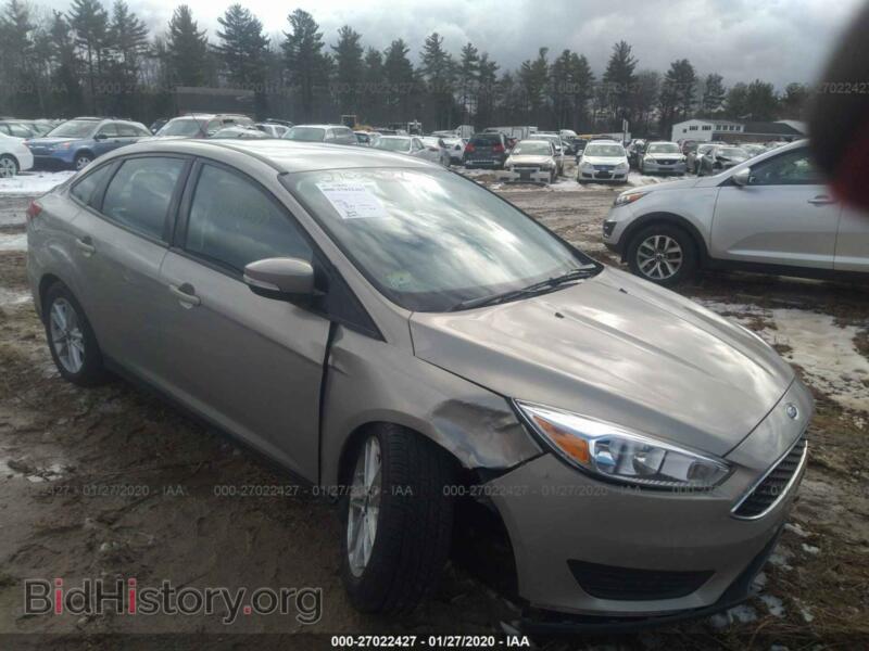 2016 Ford FOCUS SE (VIN 1FADP3F2XGL287370) — photo 1 of 11, IAAI, damage: right front