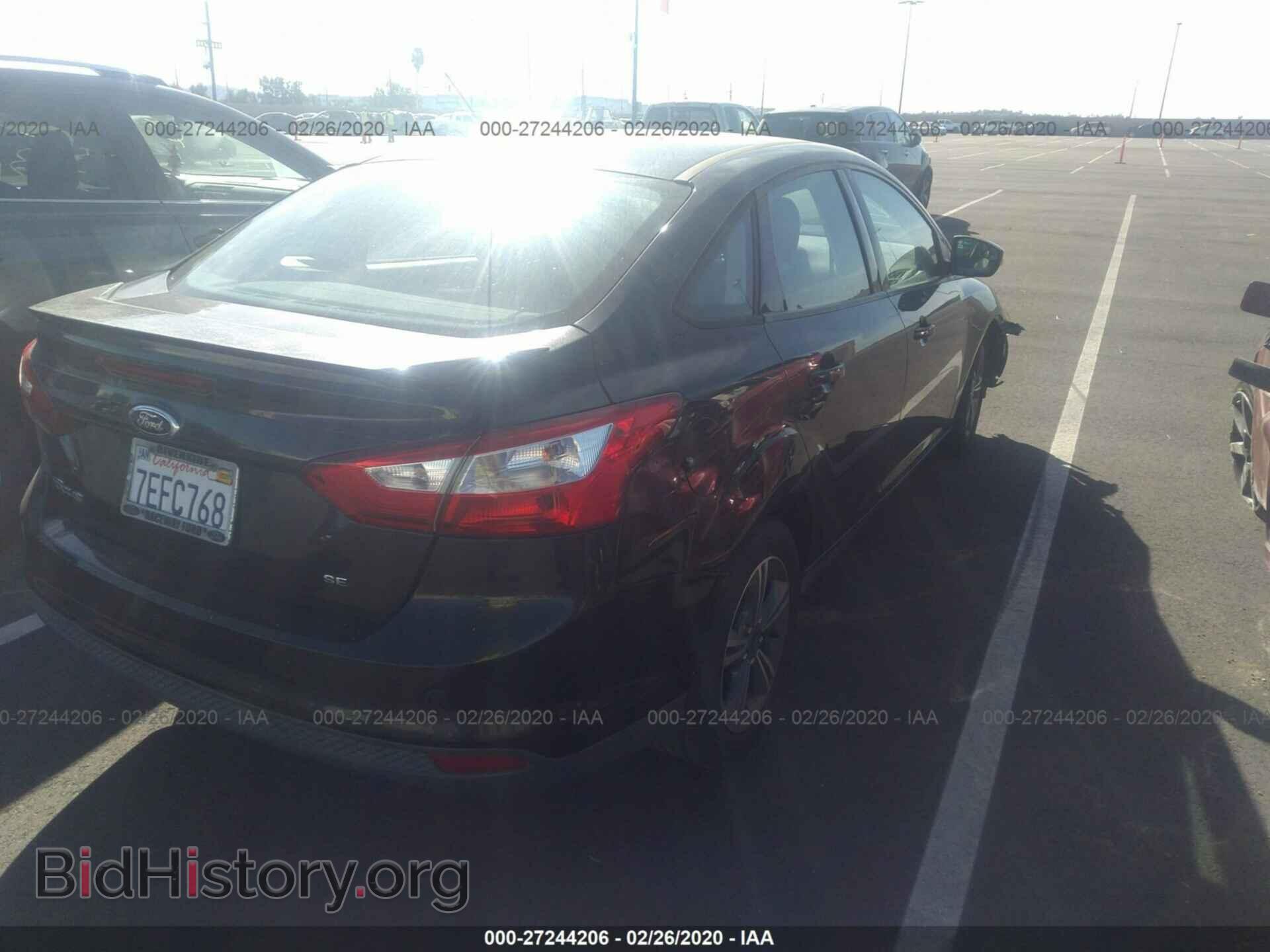 2014 Ford Focus - VIN: 1FADP3F28EL237712 - Фото 4