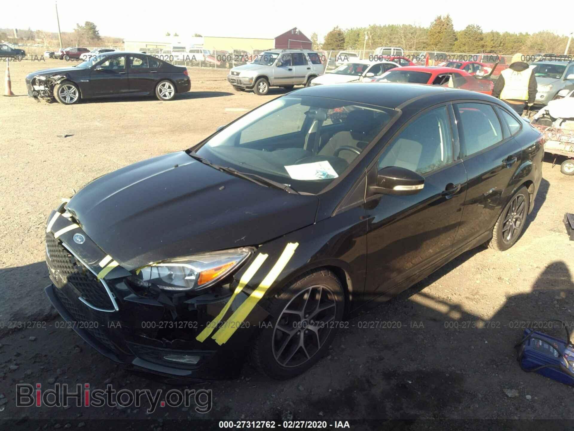2015 FORD FOCUS - VIN: 1FADP3F21FL209347 - Photo 2