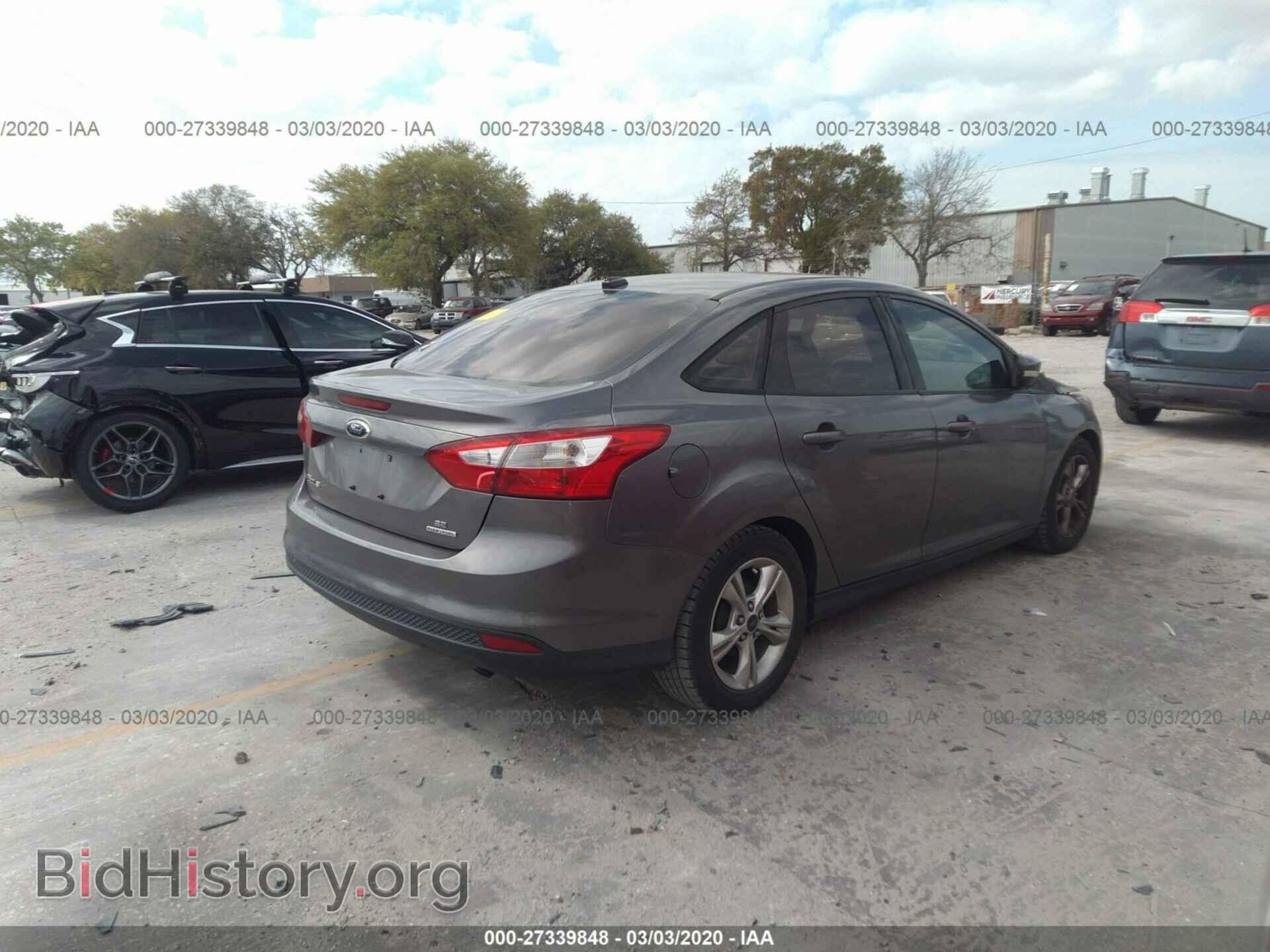 2014 FORD FOCUS - VIN: 1FADP3F28EL317821 - Photo 4