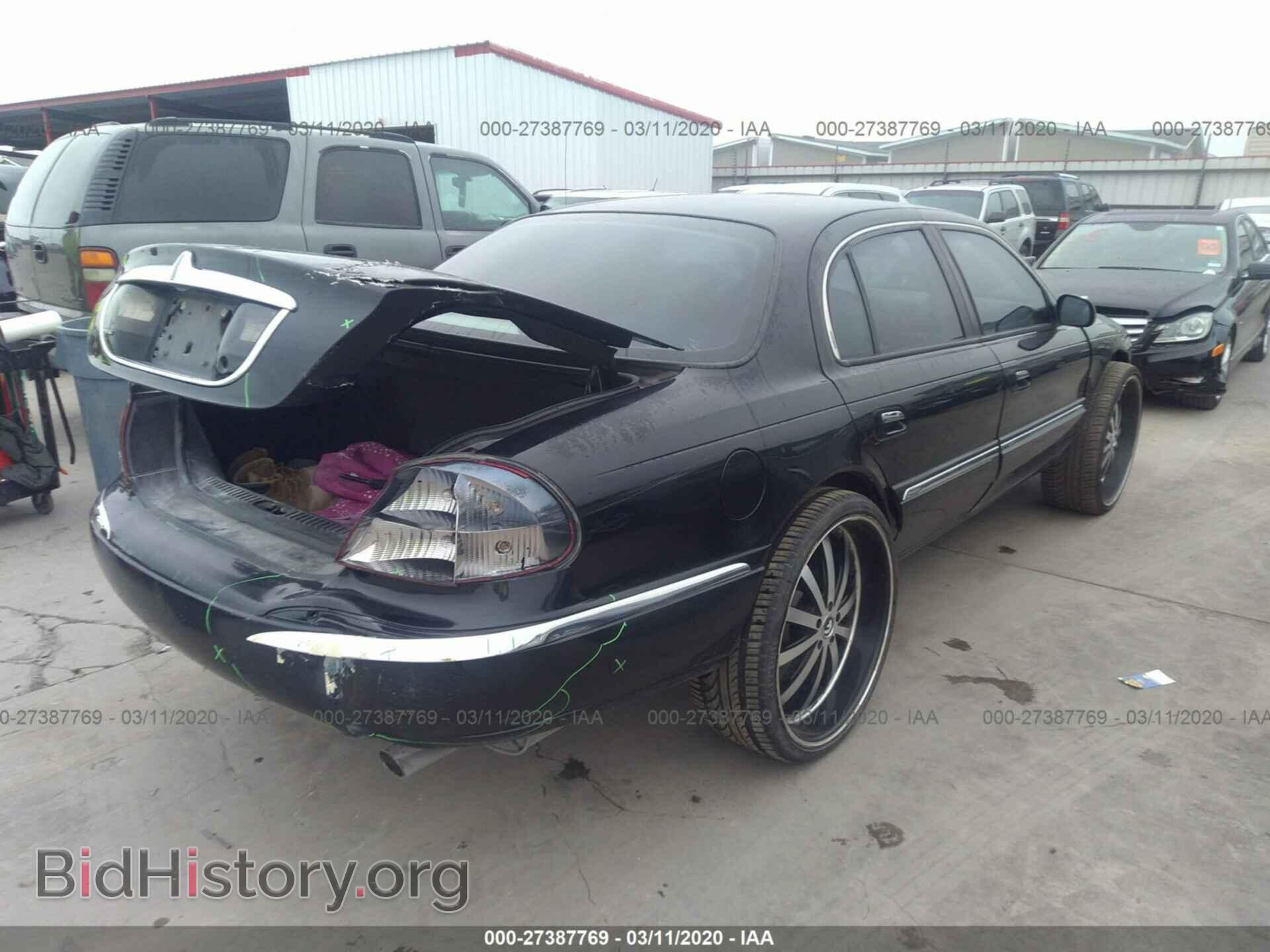 2001 LINCOLN CONTINENTAL - VIN: 1LNHM97V21Y704955 - Photo 4