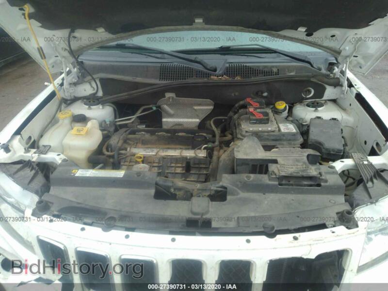 2011 Jeep COMPASS (VIN 1J4NT1FA6BD289216) — photo 10 of 11