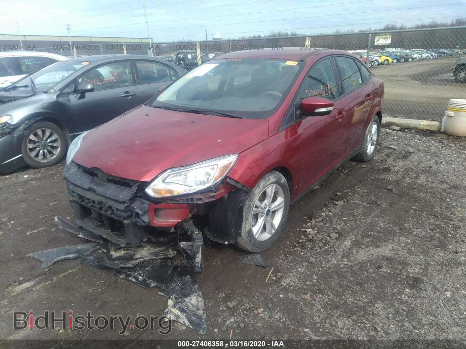 2014 Ford Focus - VIN: 1FADP3F21EL429604 - Фото 2