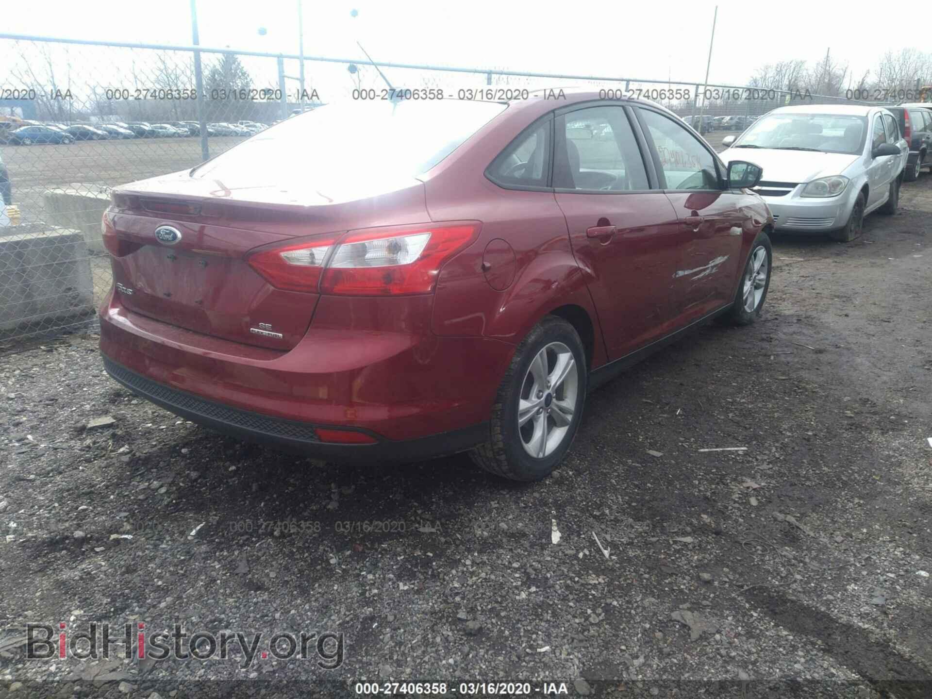 2014 Ford Focus - VIN: 1FADP3F21EL429604 - Фото 4