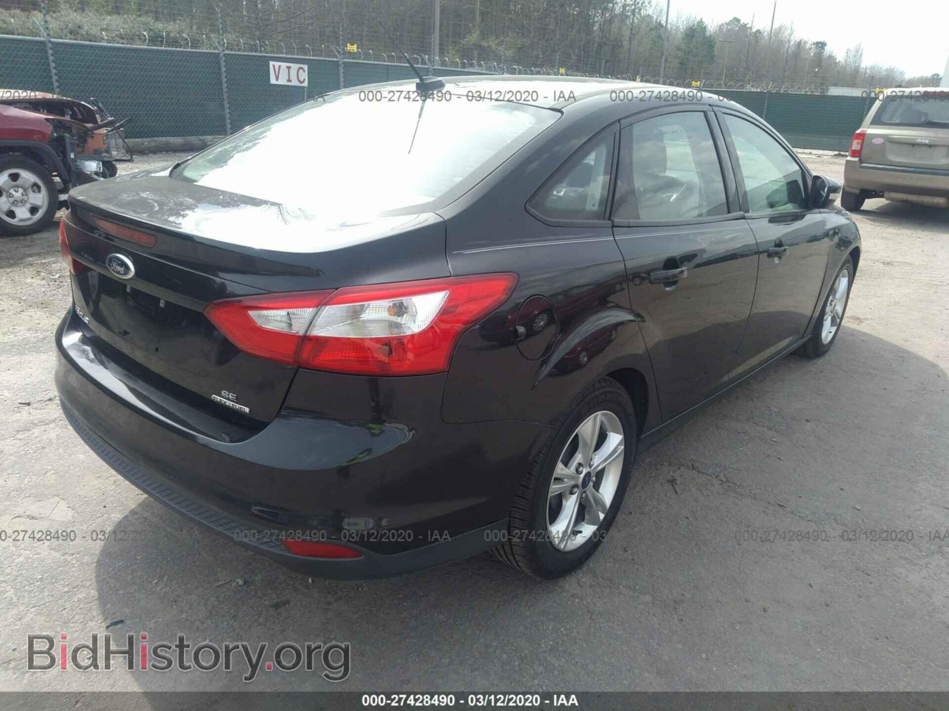 2014 FORD FOCUS - VIN: 1FADP3F22EL257695 - Photo 4