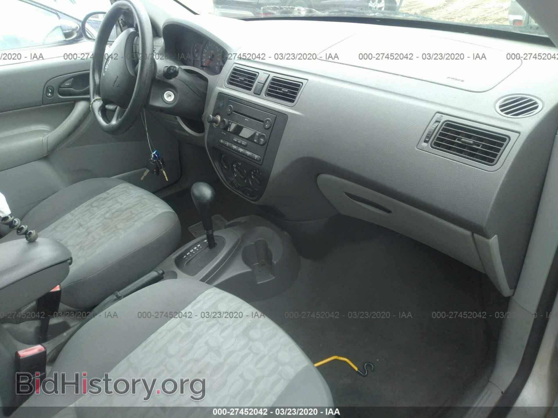 2005 Ford Focus - VIN: 1FAFP34N95W147098 - Фото 5