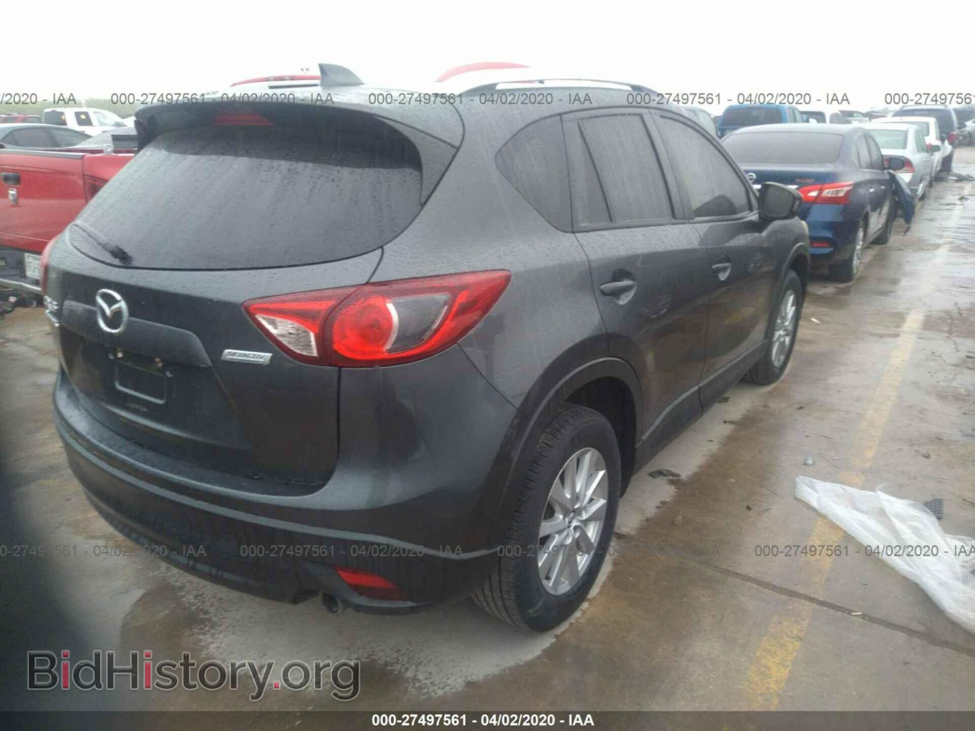 2014 MAZDA CX-5 - VIN: JM3KE2CY0E0394539 - Фото 4