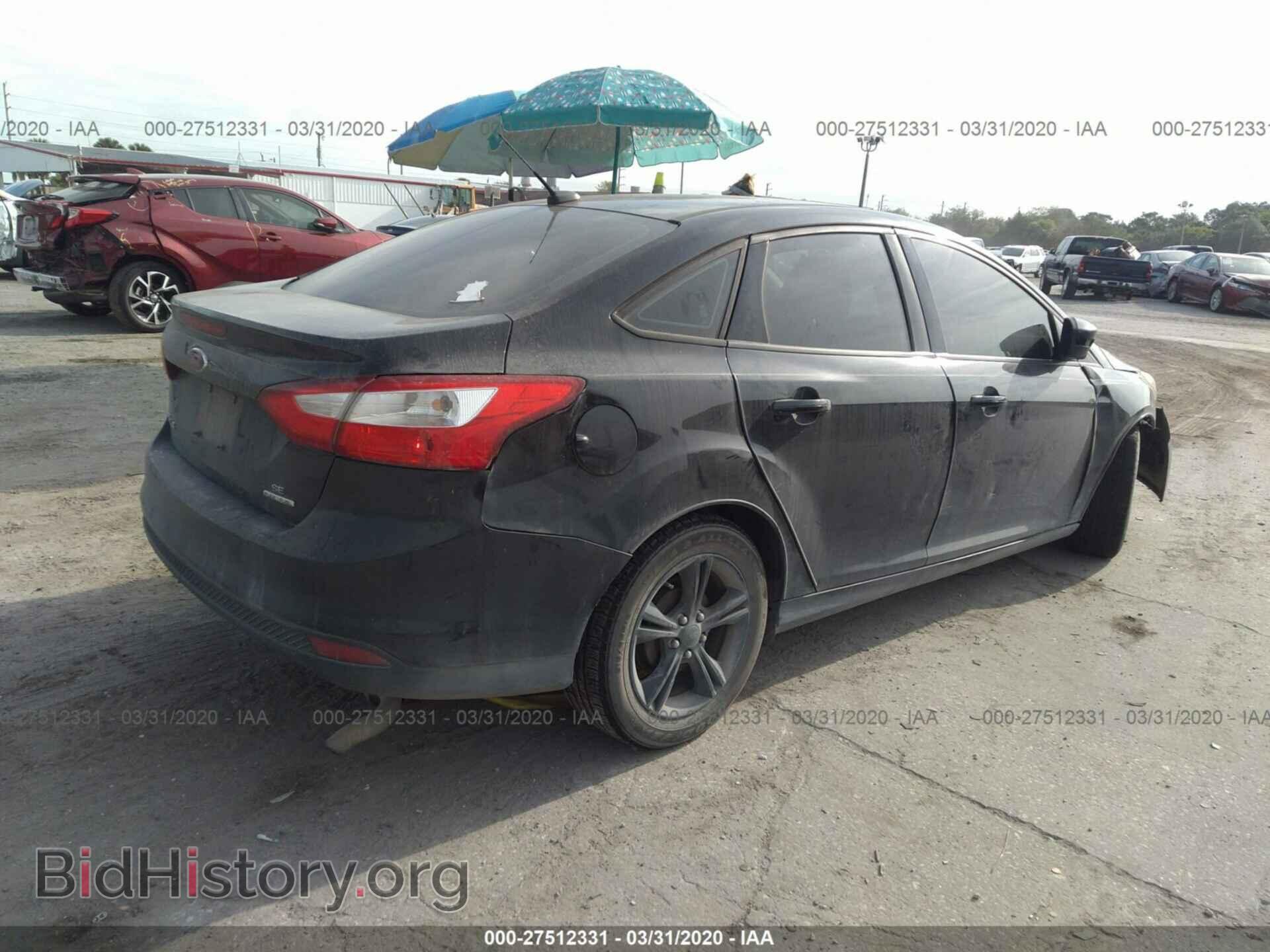 2014 FORD FOCUS - VIN: 1FADP3F22EL396581 - Photo 4