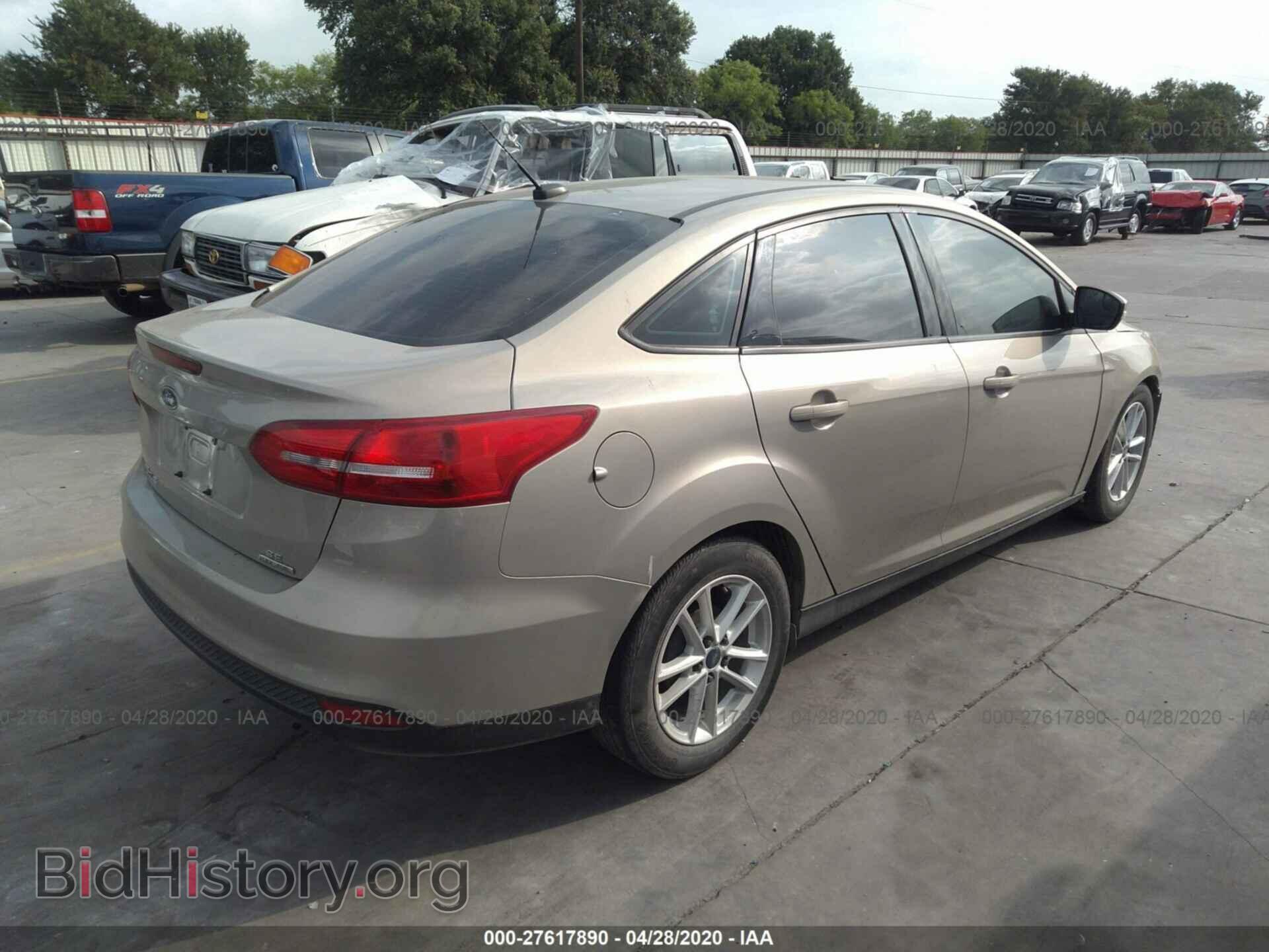 2015 FORD FOCUS - VIN: 1FADP3F25FL385009 - Photo 4