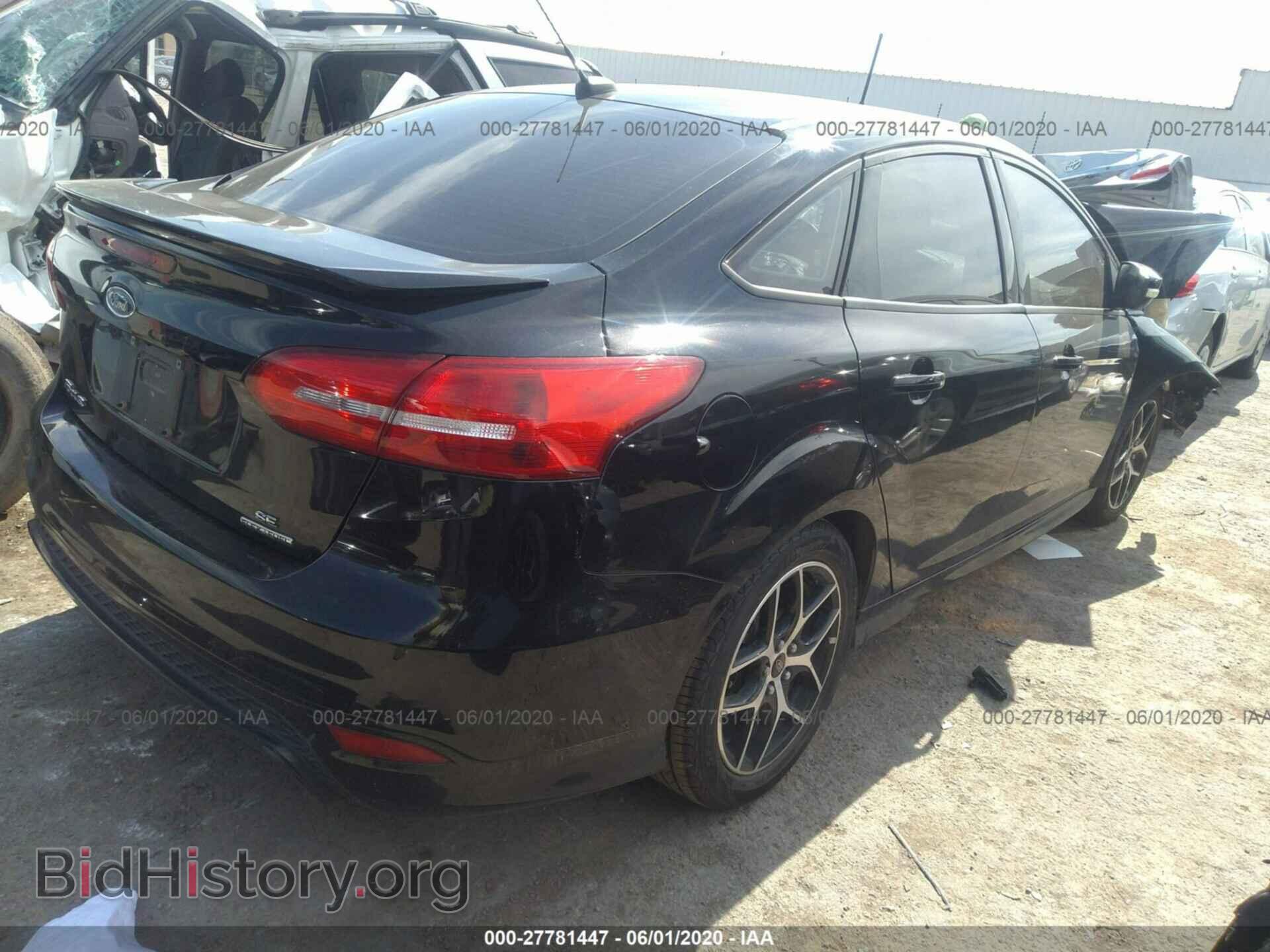 2016 FORD FOCUS - VIN: 1FADP3F2XGL220946 - Photo 4