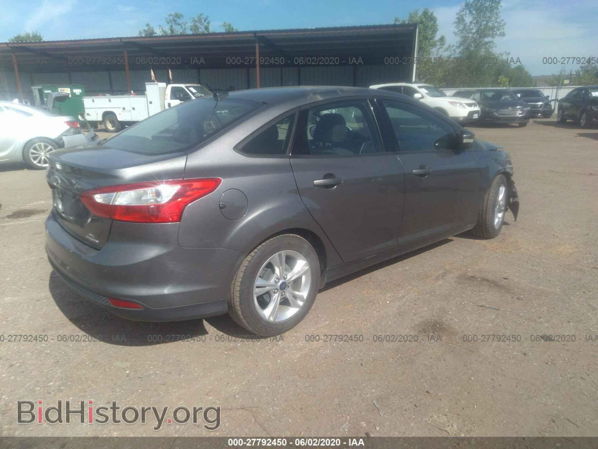 2014 FORD FOCUS - VIN: 1FADP3F28EL179942 - Photo 4