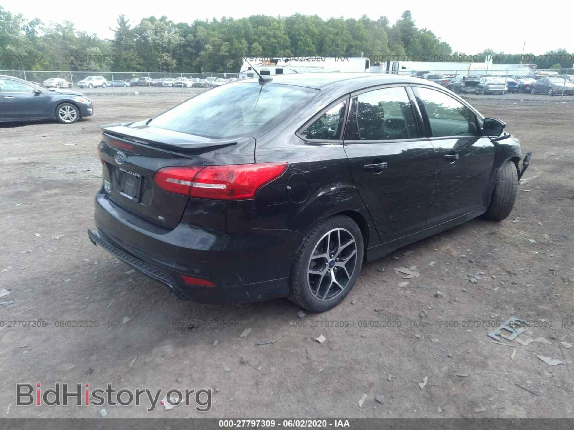 2015 FORD FOCUS - VIN: 1FADP3F21FL279169 - Photo 4