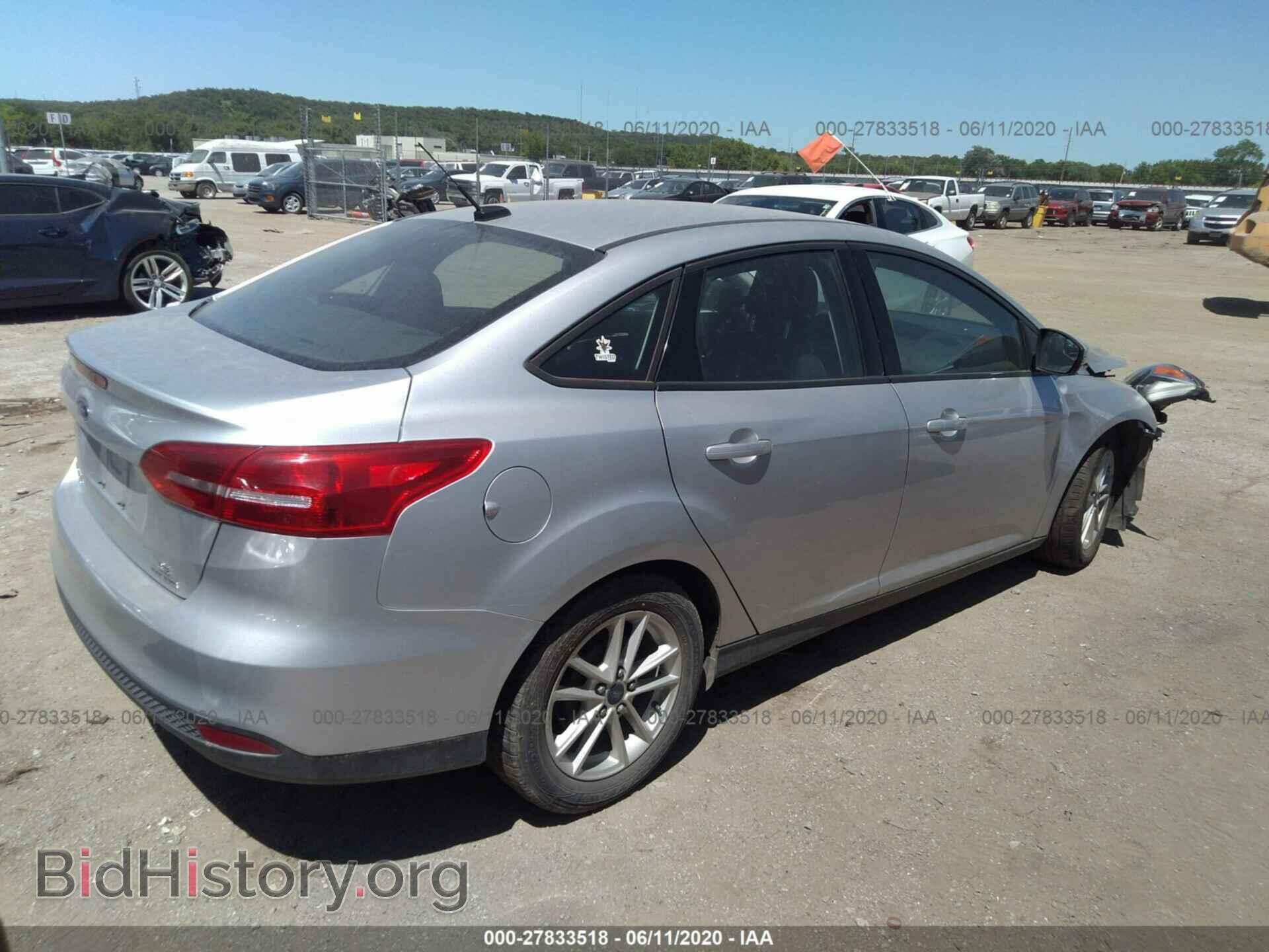 2016 FORD FOCUS - VIN: 1FADP3F21GL264740 - Photo 4