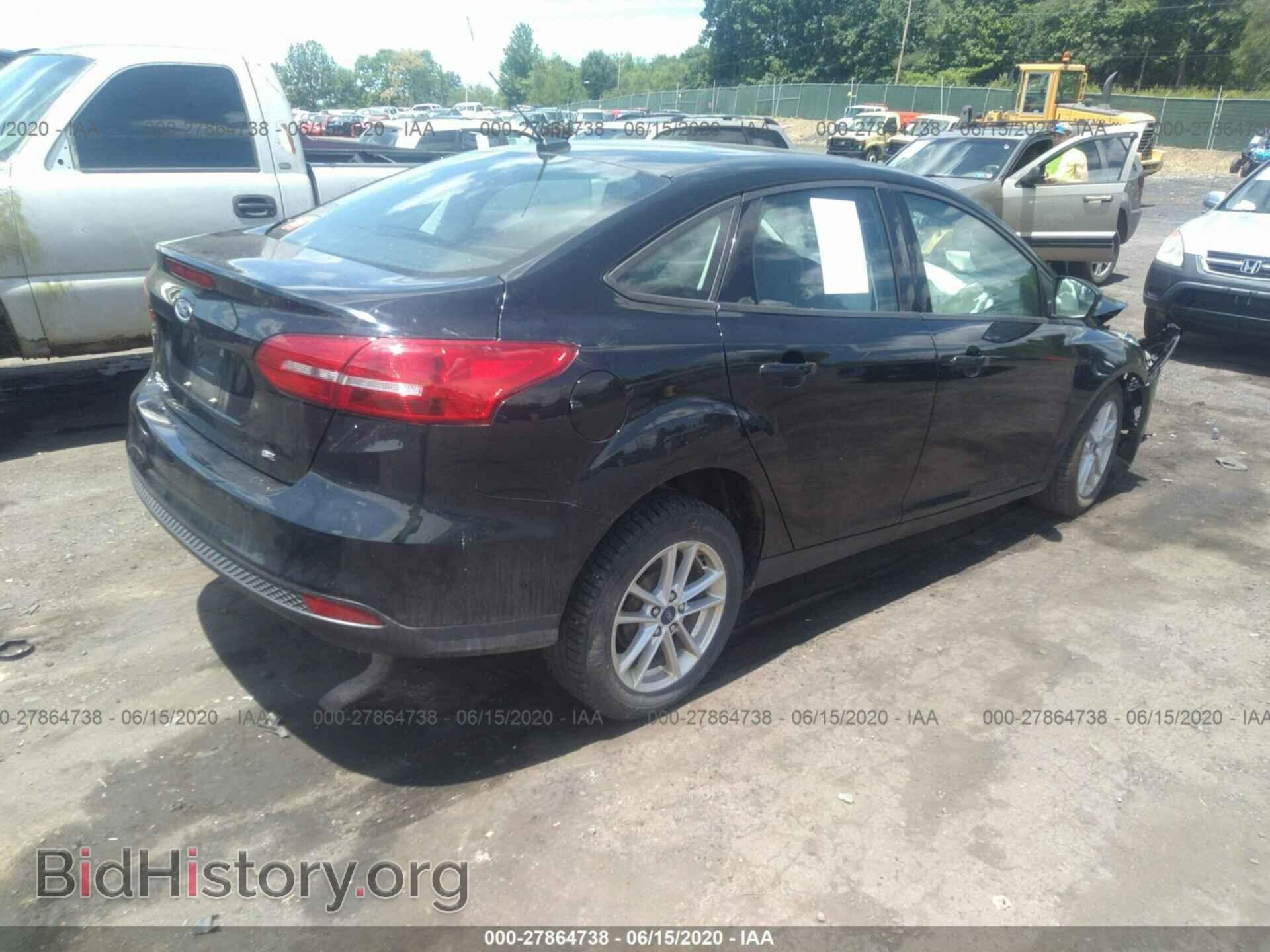 2017 FORD FOCUS - VIN: 1FADP3F24HL316878 - Photo 4
