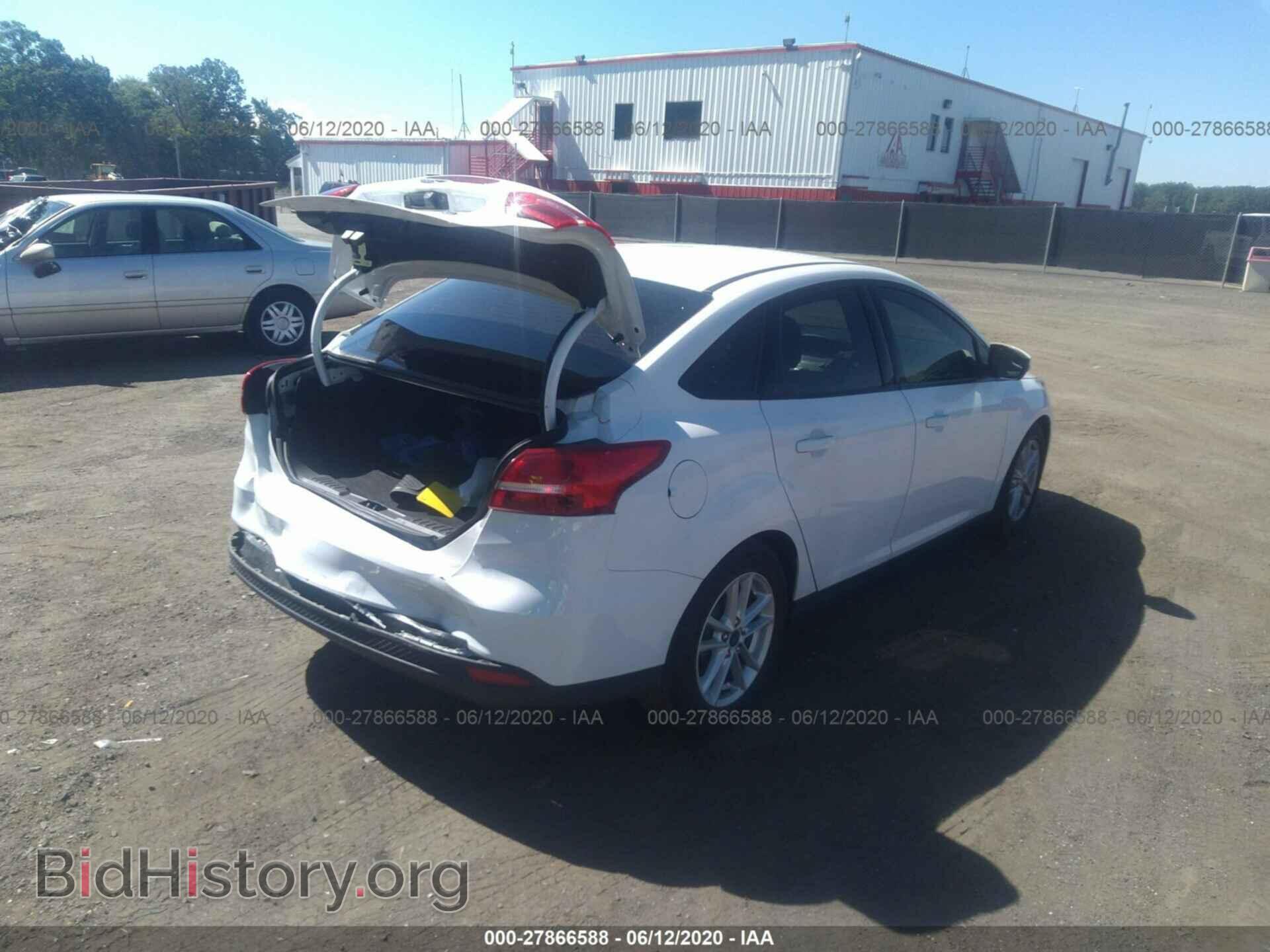 2016 FORD FOCUS - VIN: 1FADP3F29GL304014 - Photo 4