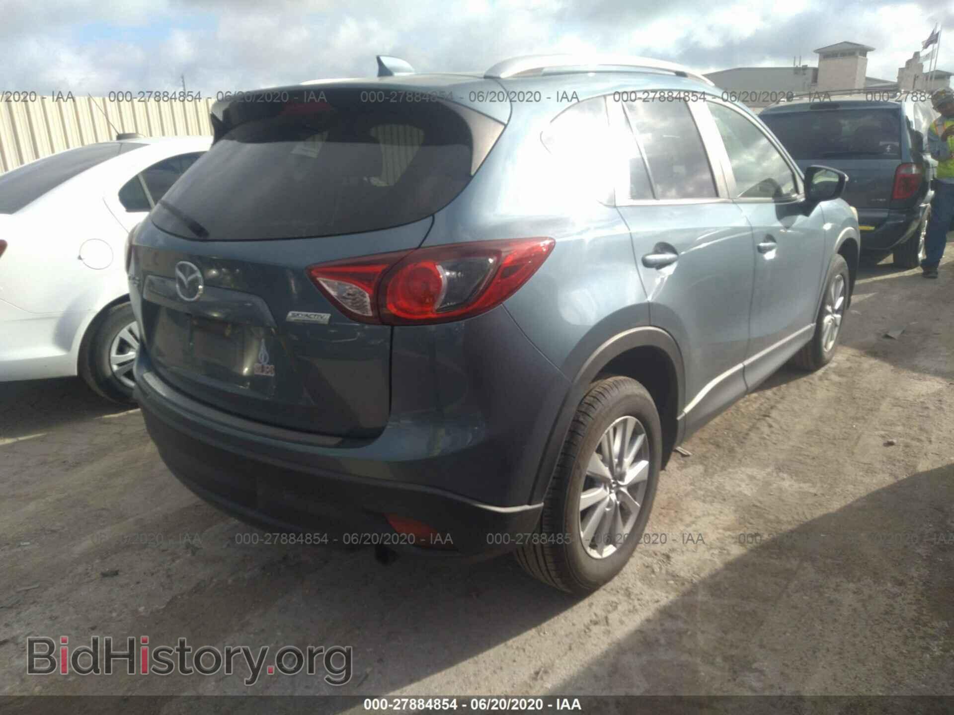 2015 MAZDA CX-5 - VIN: JM3KE2CY1F0521509 - Фото 4