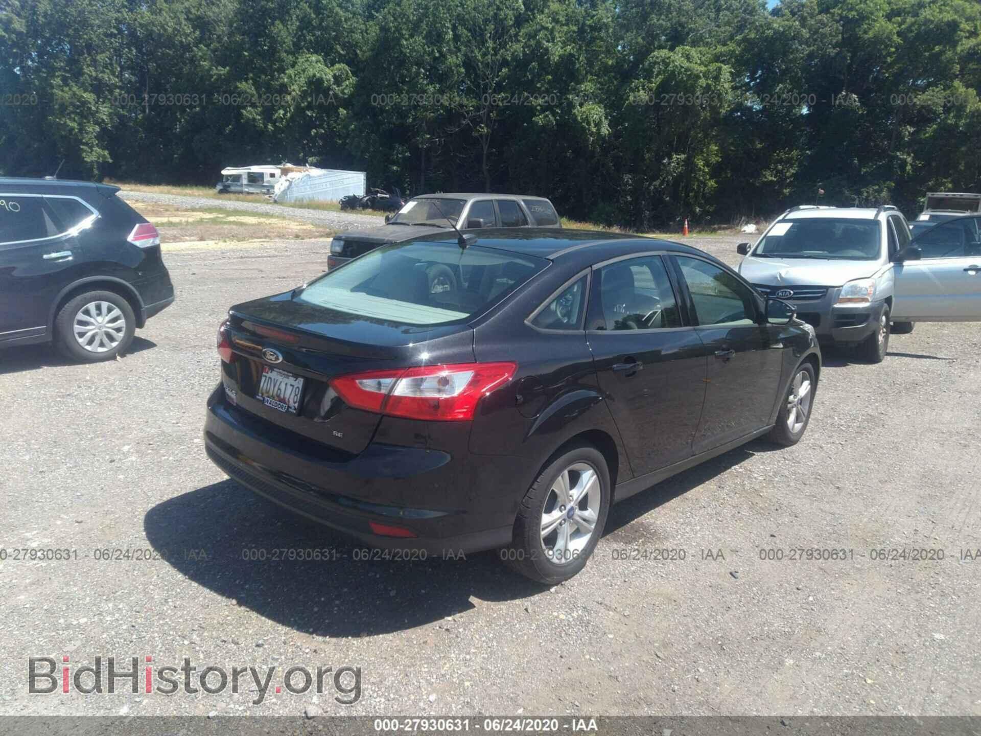 2013 FORD FOCUS - VIN: 1FADP3F24DL207024 - Photo 4