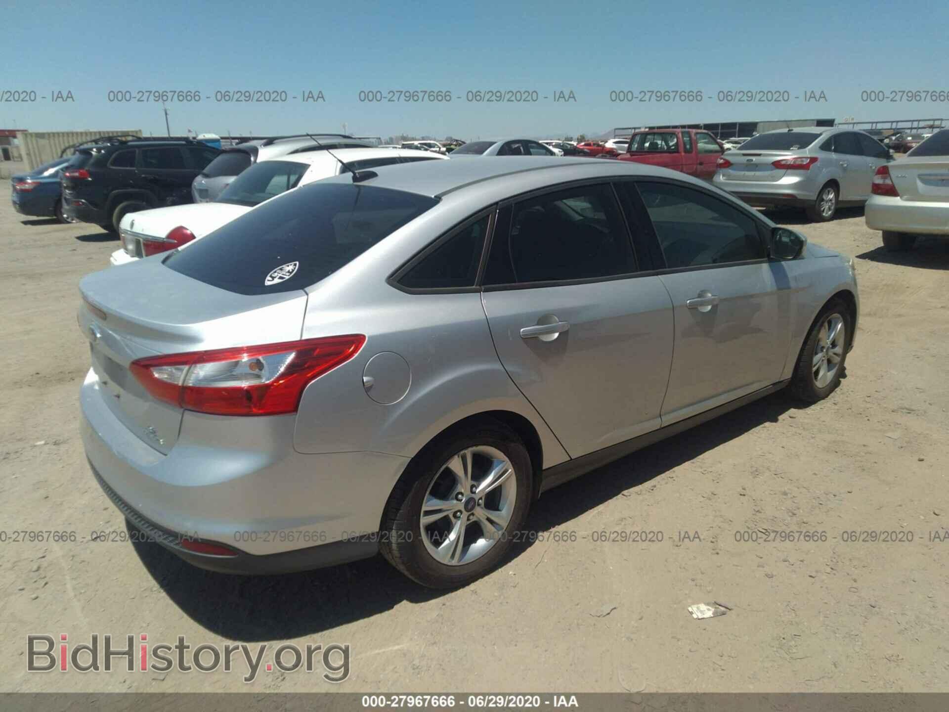 2014 FORD FOCUS - VIN: 1FADP3F25EL237778 - Photo 4