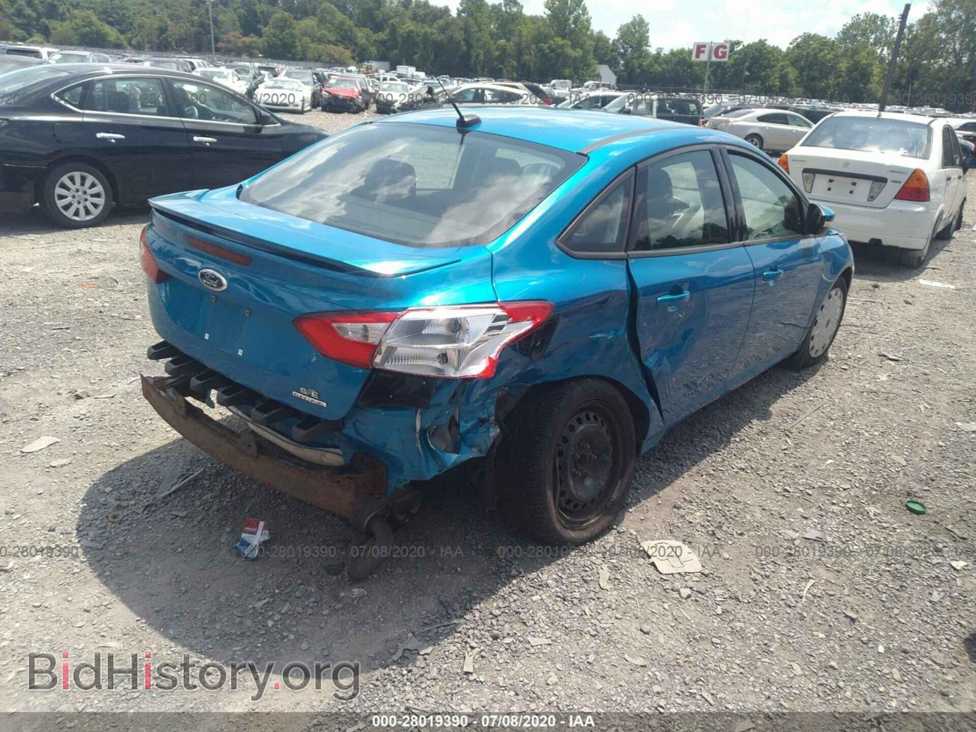 2014 FORD FOCUS - VIN: 1FADP3F20EL158972 - Photo 4