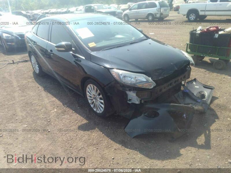 2012 Ford FOCUS Titanium (VIN 1FAHP3J29CL215000) — фото 1 из 11, IAAI, повреждение: передняя часть