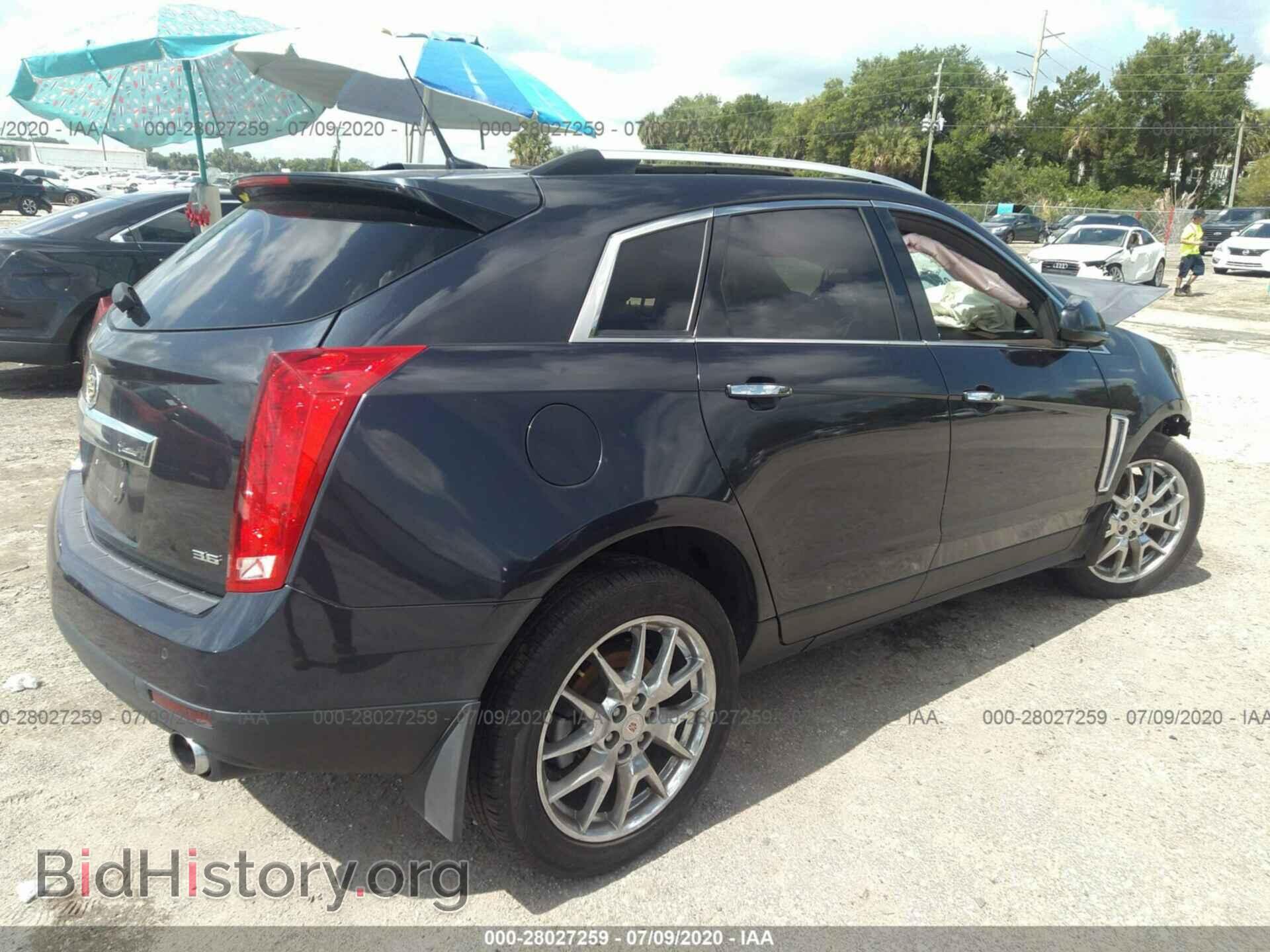 2014 CADILLAC SRX - VIN: 3GYFNCE36ES589260 - Фото 4