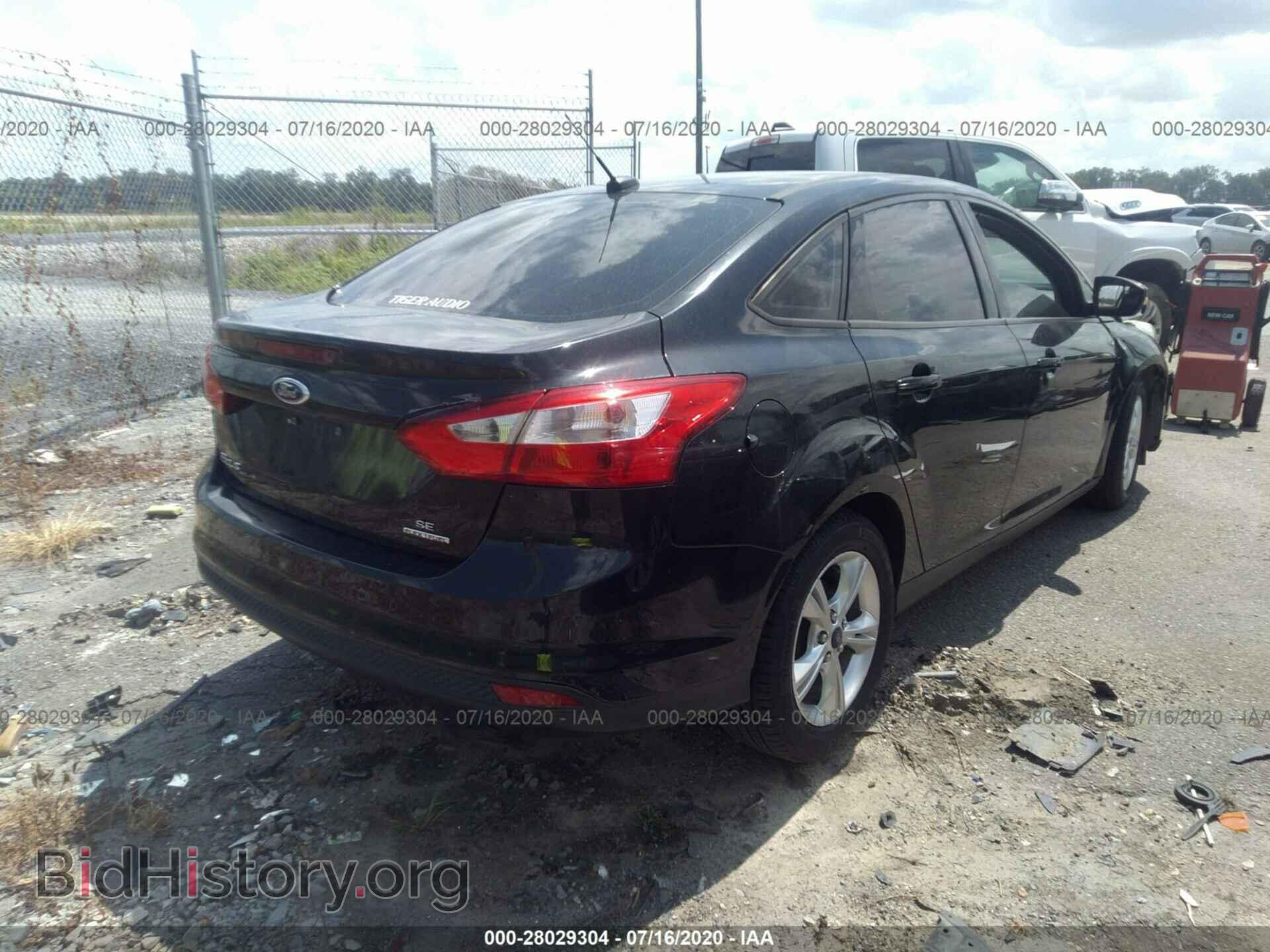 2014 FORD FOCUS - VIN: 1FADP3F21EL291773 - Photo 4