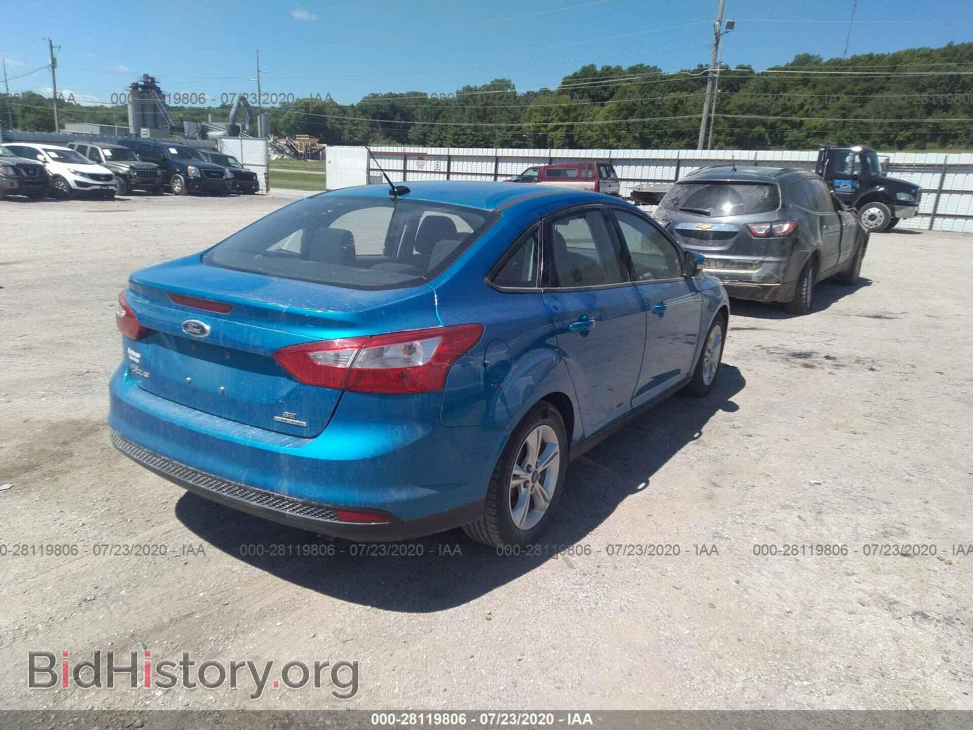 2014 FORD FOCUS - VIN: 1FADP3F29EL369717 - Photo 4