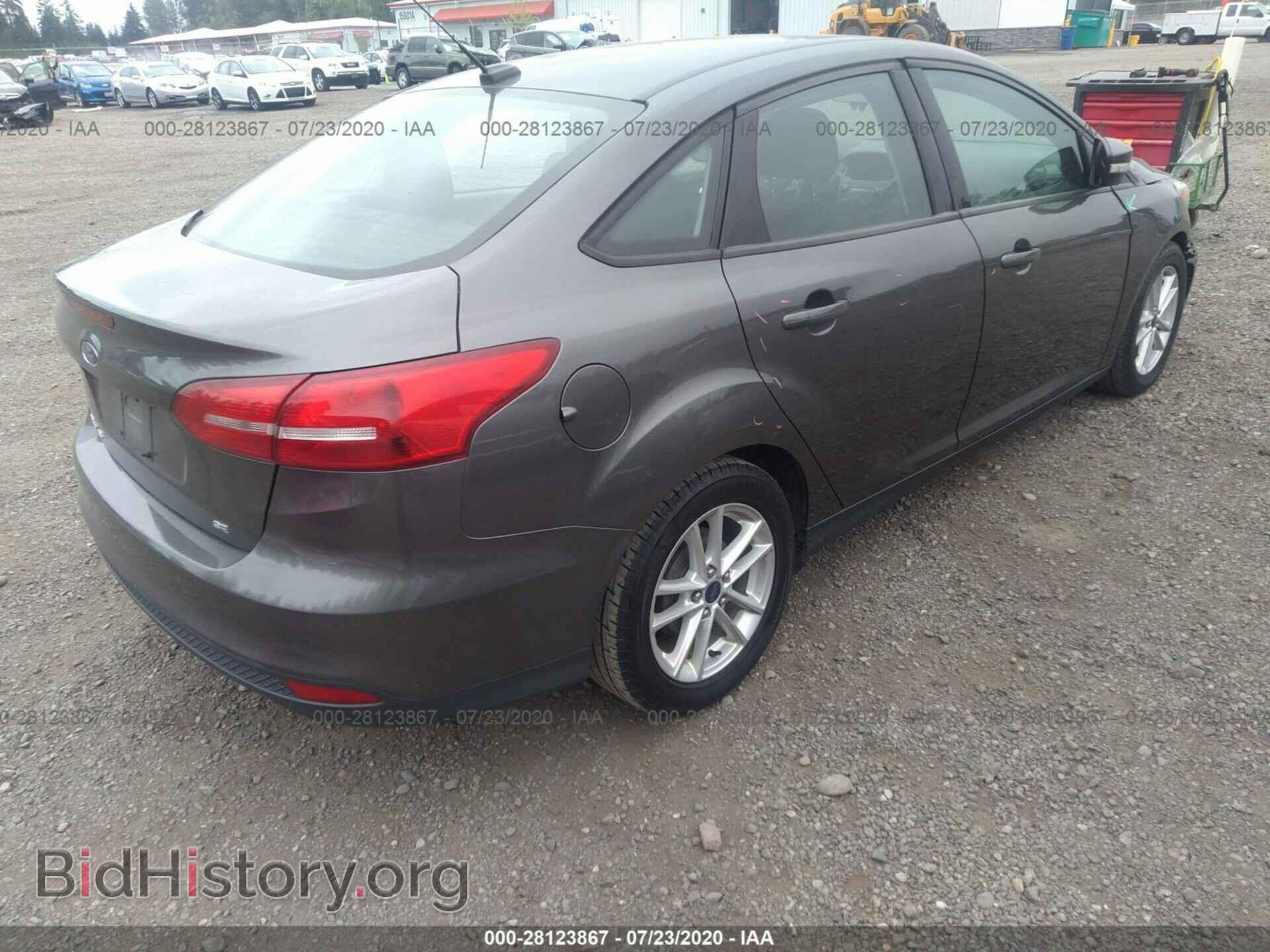 2016 FORD FOCUS - VIN: 1FADP3F21GL261613 - Photo 4