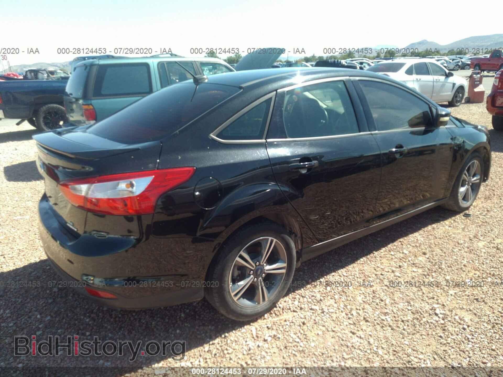 2014 FORD FOCUS - VIN: 1FADP3F25EL311121 - Photo 4
