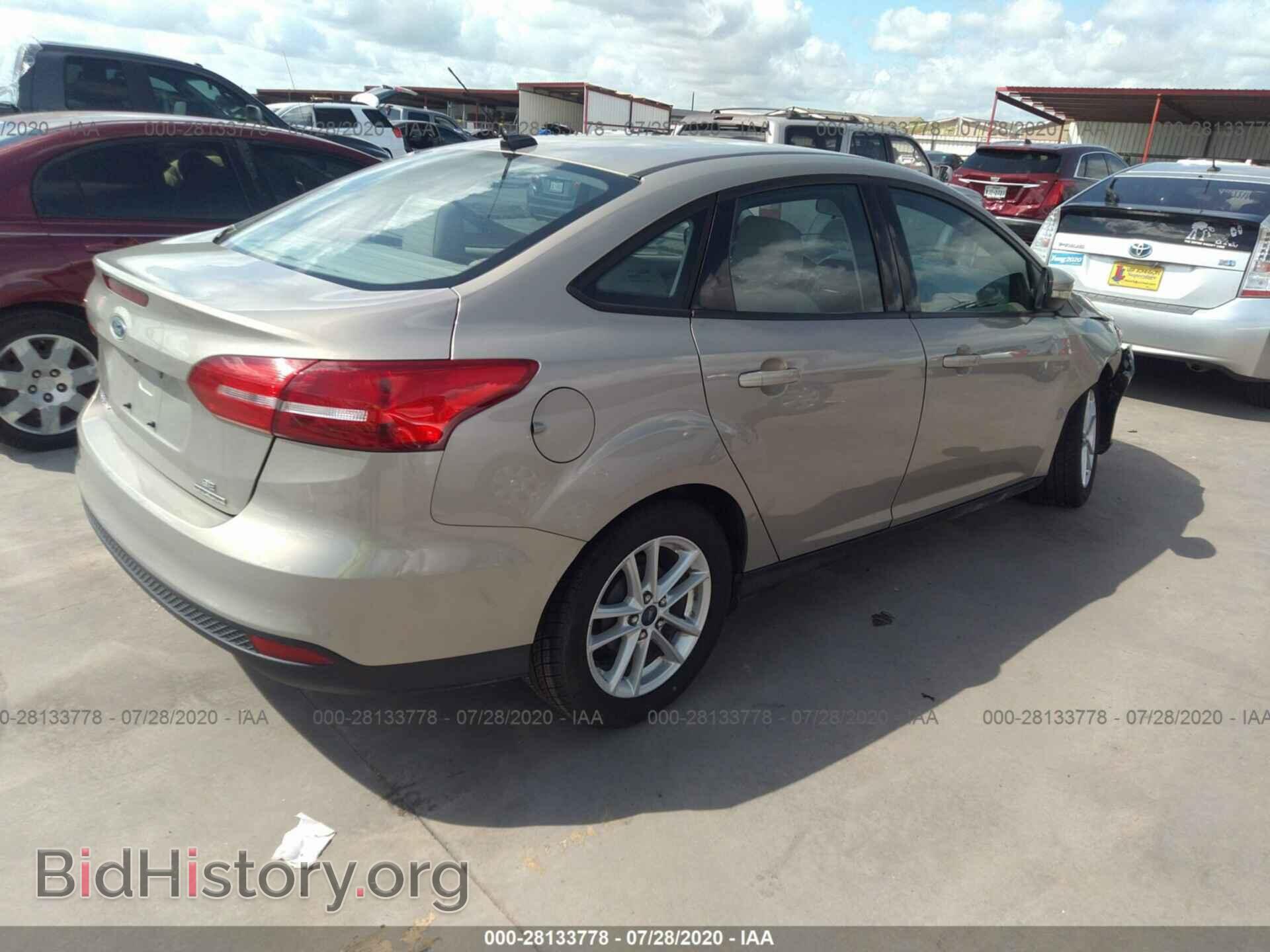 2015 FORD FOCUS - VIN: 1FADP3F26FL210557 - Photo 4
