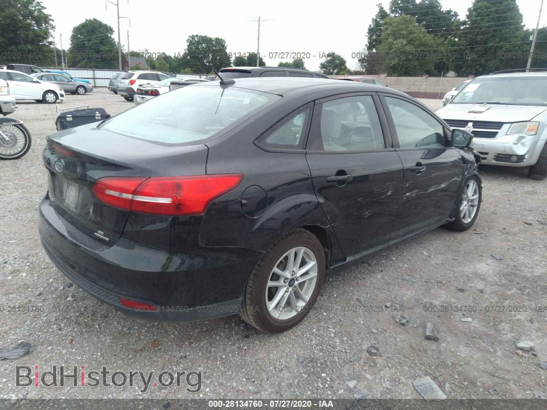 2015 FORD FOCUS - VIN: 1FADP3F22FL263384 - Photo 4