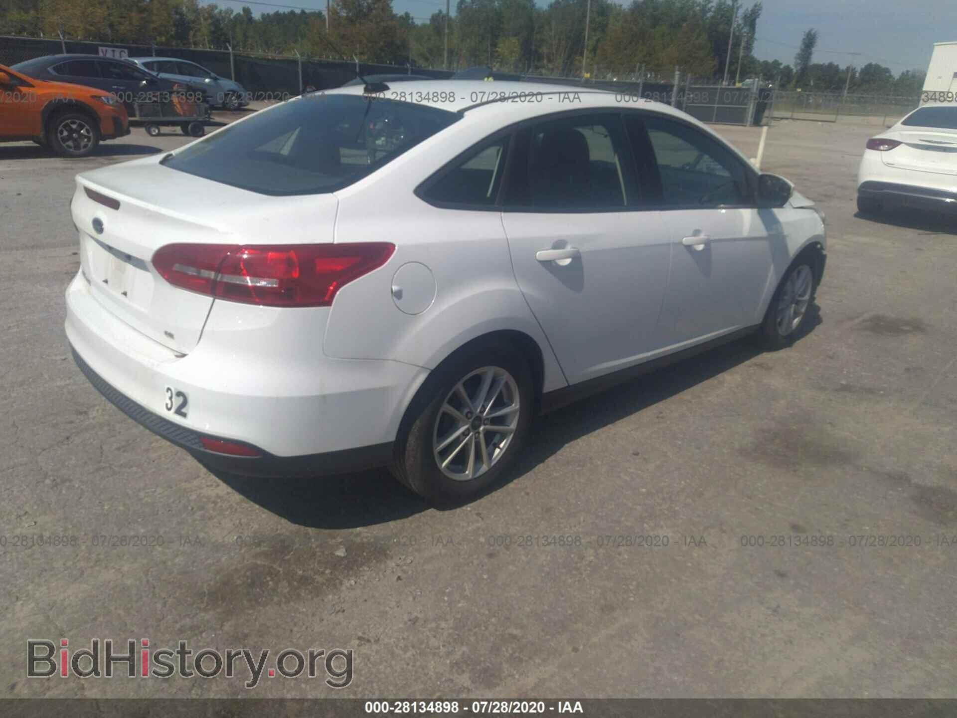 2017 FORD FOCUS - VIN: 1FADP3F25HL286984 - Photo 4