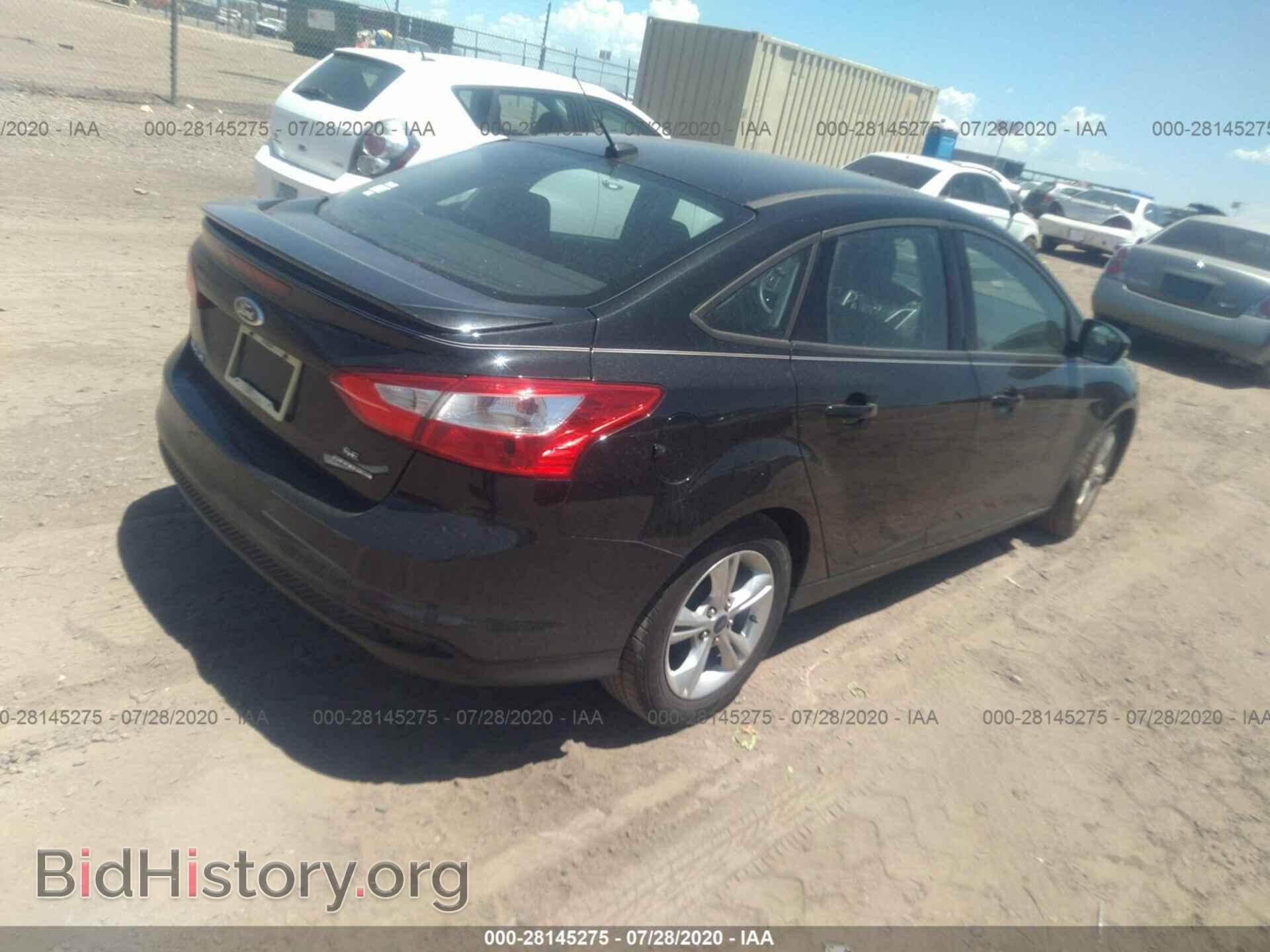 2014 FORD FOCUS - VIN: 1FADP3F23EL197717 - Photo 4