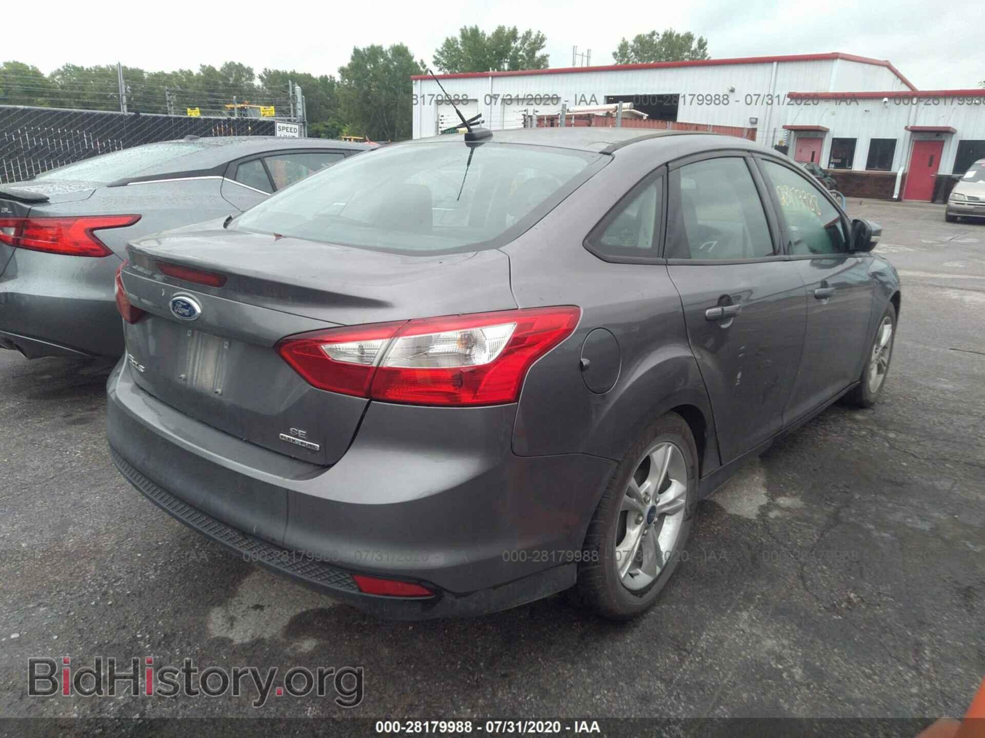 2014 FORD FOCUS - VIN: 1FADP3F21EL431336 - Photo 4