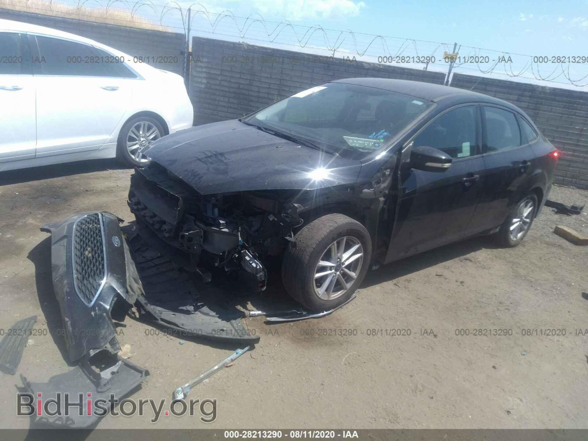 2015 FORD FOCUS - VIN: 1FADP3F22FL334678 - Photo 2