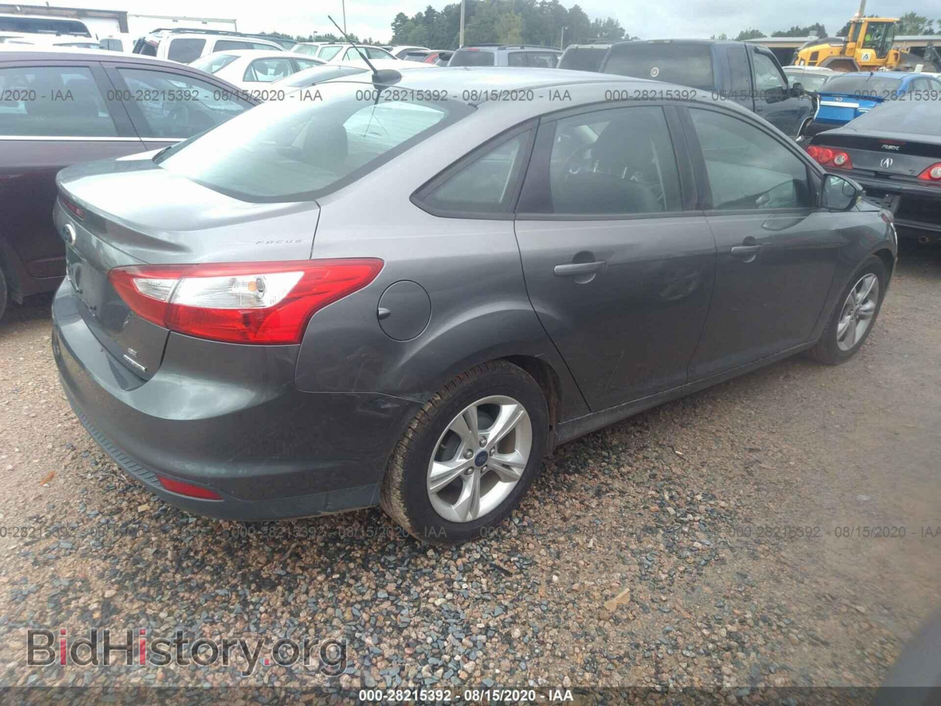 2014 FORD FOCUS - VIN: 1FADP3F20EL298066 - Photo 4