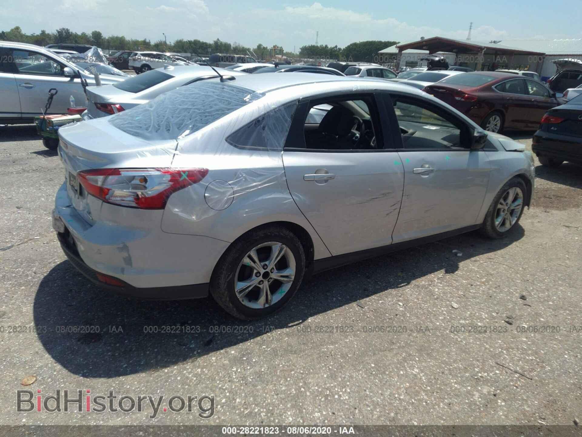 2014 FORD FOCUS - VIN: 1FADP3F23EL287949 - Photo 4