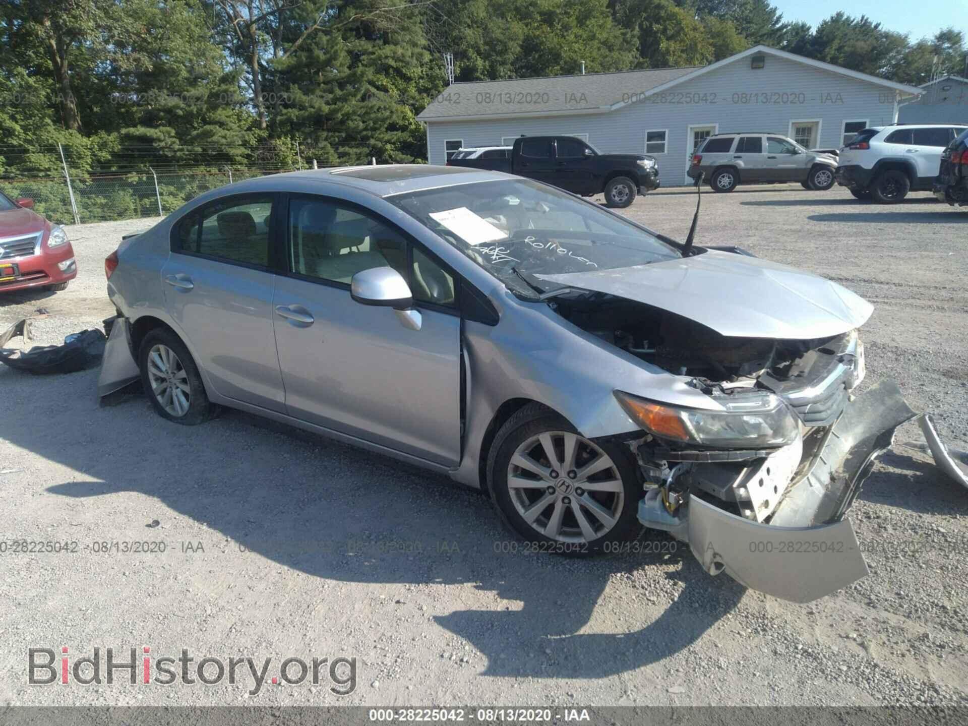 Фотография 19XFB2F87CE320828 - HONDA CIVIC SDN 2012