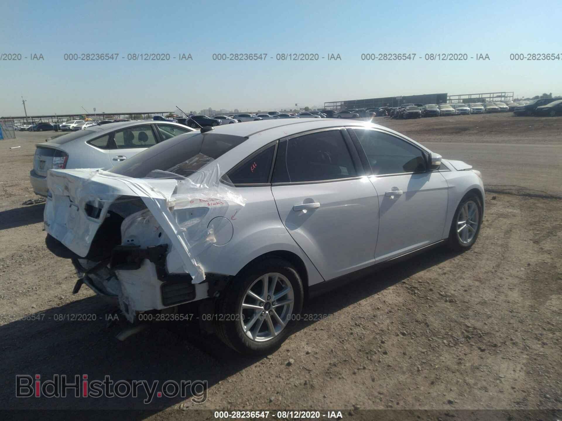 2016 FORD FOCUS - VIN: 1FADP3F27GL282904 - Photo 4