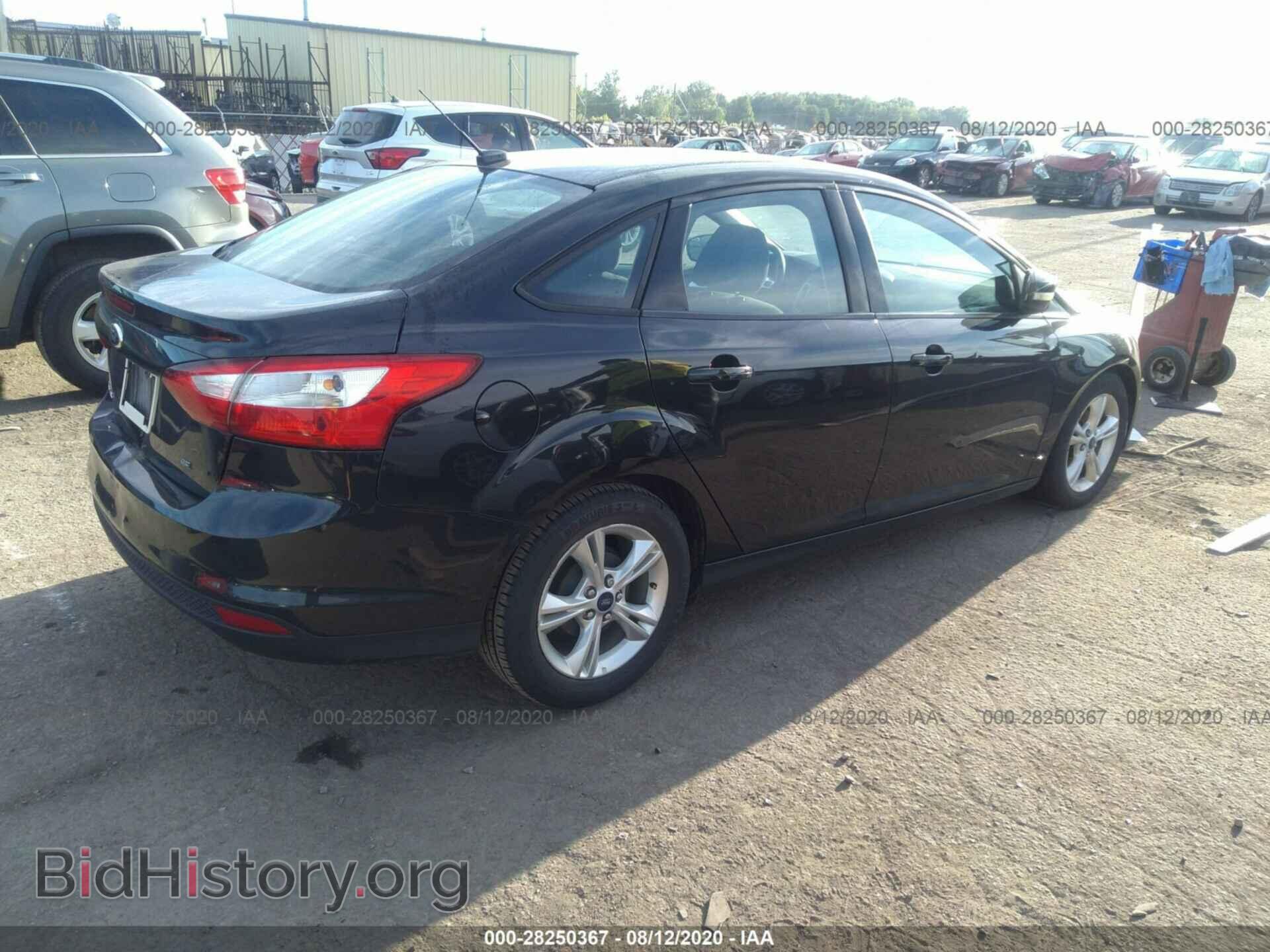 2014 FORD FOCUS - VIN: 1FADP3F29EL140082 - Photo 4