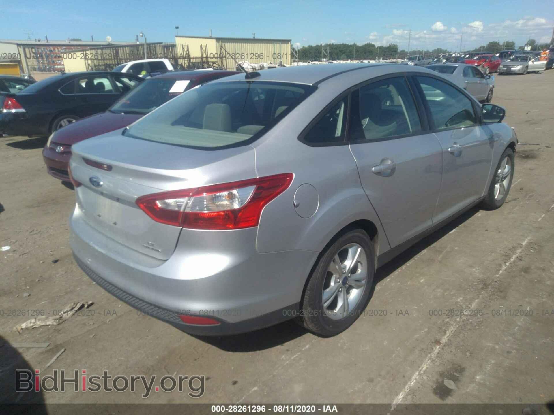 2014 FORD FOCUS - VIN: 1FADP3F21EL354595 - Photo 4