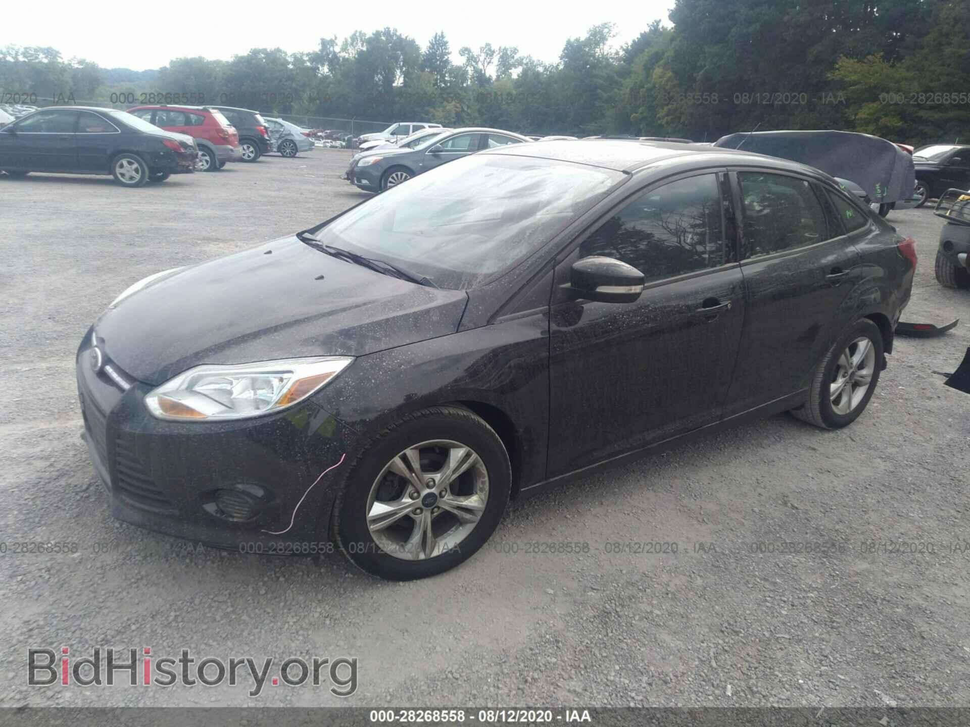 2014 FORD FOCUS - VIN: 1FADP3F21EL148077 - Photo 2